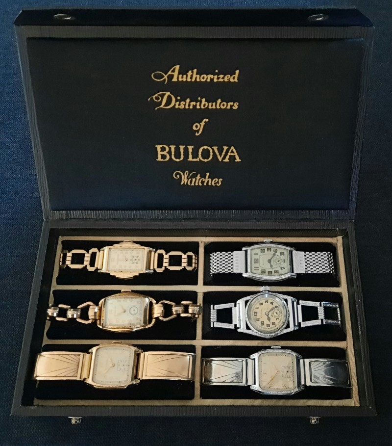 1920s-1930s Authorized Distributors of Bulova Watches case holding 6 watches.