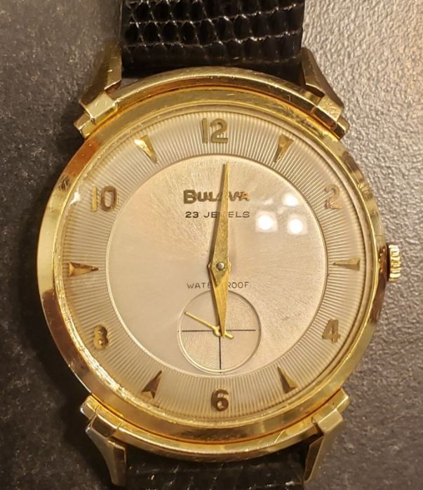 Front of the watch showing incorrectly refinished dial.