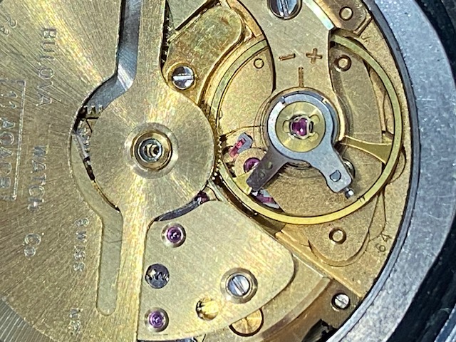 64 is inscribed on the main plate