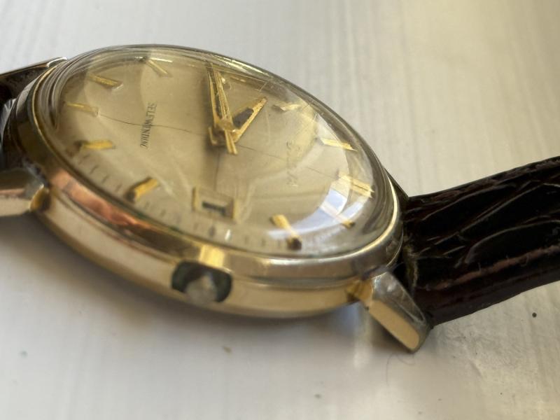 27/5/25 - side of case showing winder (missing original cap)