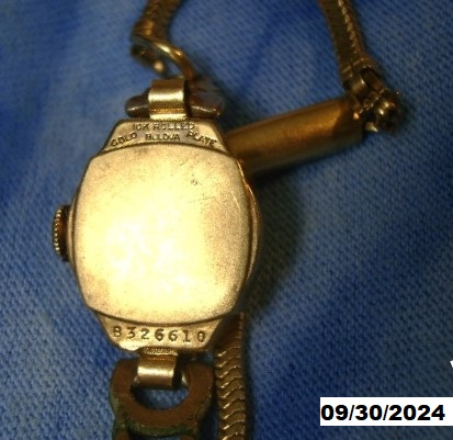 Case back;  10K ROLLED GOLD PLATE BULOVA  B326610
