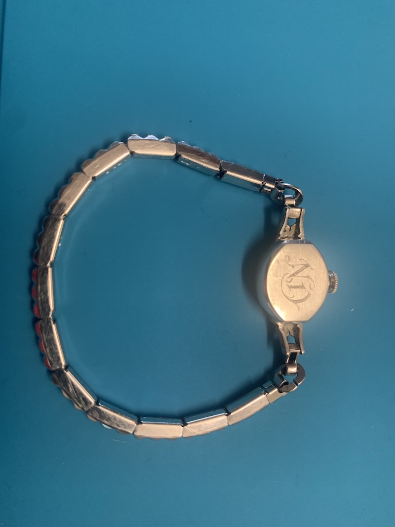 Back of watch (not sure if original back cover).  