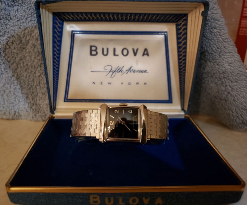 Watch and its original box.