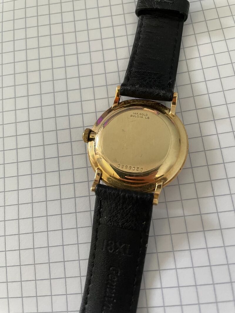 Back picture showing the brand name and 14k gold